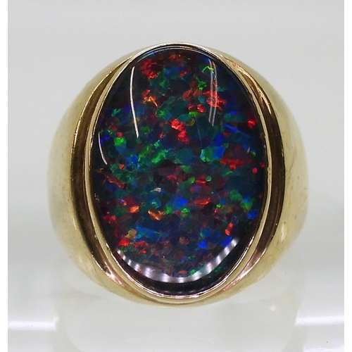 2828 - A 9CT GOLD OPAL TRIPLET RINGin the classic signet ring style, finger size T1/2, weight 10.3gms... 