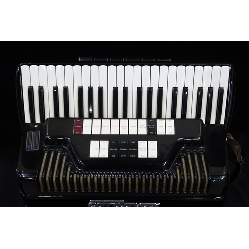 318 - CORDOVOX a Cordovox 120 bass 41 key piano accordion with case In 1962, a Farfisa technical team led ... 