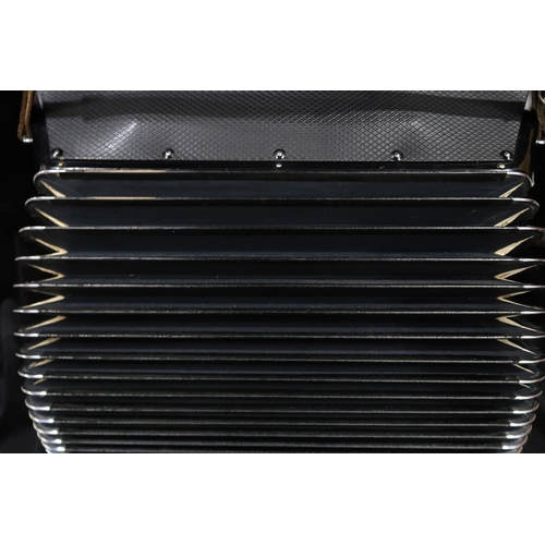 318 - CORDOVOX a Cordovox 120 bass 41 key piano accordion with case In 1962, a Farfisa technical team led ... 