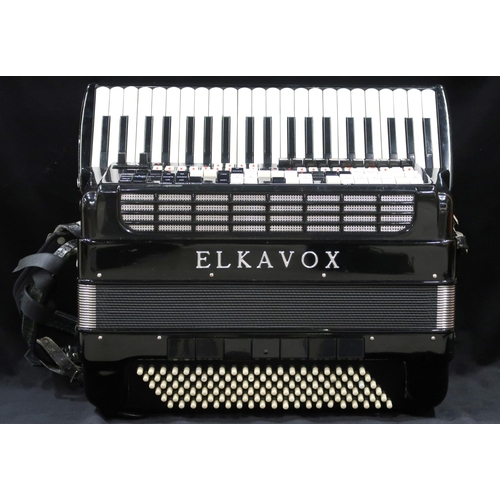 319 - An Elkavox 83 120 bass 41 key piano accordion with case