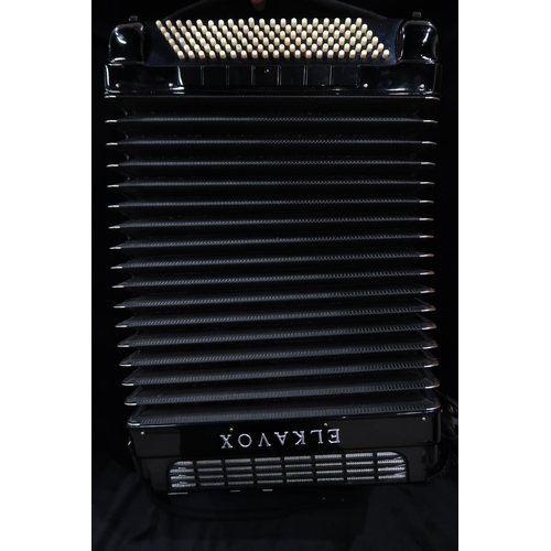 319 - An Elkavox 83 120 bass 41 key piano accordion with case