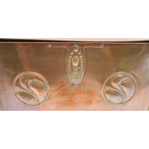 2317 - AN ARTS AND CRAFTS COPPER AND BRASS COAL BINof rectangular form with heart terminal handles to eithe... 