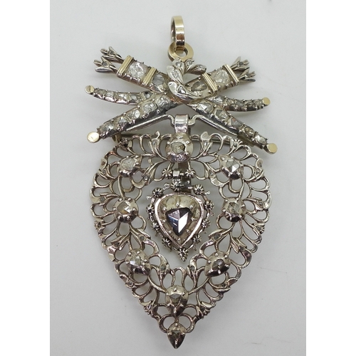 2808 - A 19TH CENTURY FLEMISH PENDANT BROOCHheart shaped, surmounted with a bow and arrows in quivers. Made... 