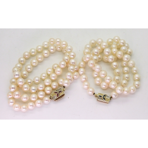 2829 - PEARLS WITH A METAMORPHIC CLASPthe double string of pearls has a ruby sapphire and diamond 14k gold ... 