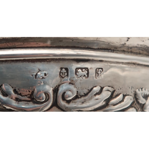 283 - An Edwardian silver sugar bowl, Birmingham 1905, with scrolling foliate decoration, and two silver n... 