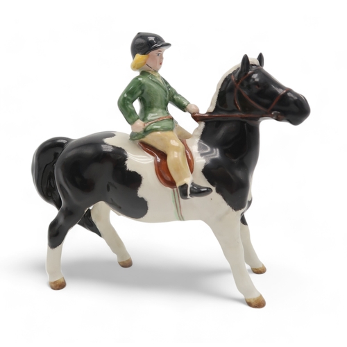 2291 - WITHDRAWNBESWICK GIRL ON PIEBALD PONYmodel 1499, printed mark to base