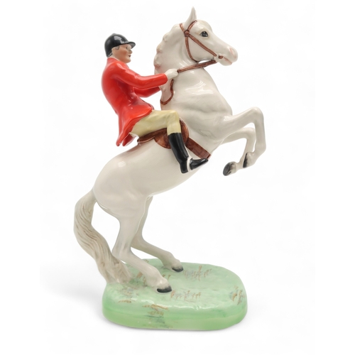 2296 - A BESWICK HUNTSMAN ON WHITE REARING HORSEmodel 868, printed and impressed marks to base... 