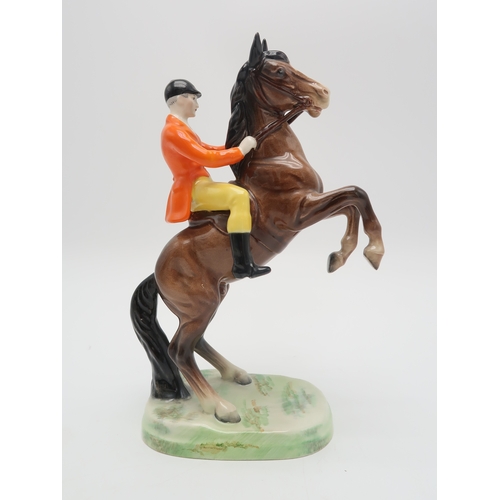 2298 - BESWICK HUNTSMAN ON REARING HORSEmodel 868, first version with yellow breeches and orange jacket, pr... 