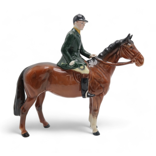 2299 - BESWICK HUNTSMAN ON HORSEmodel 1501 with green jacket, printed mark to underside... 