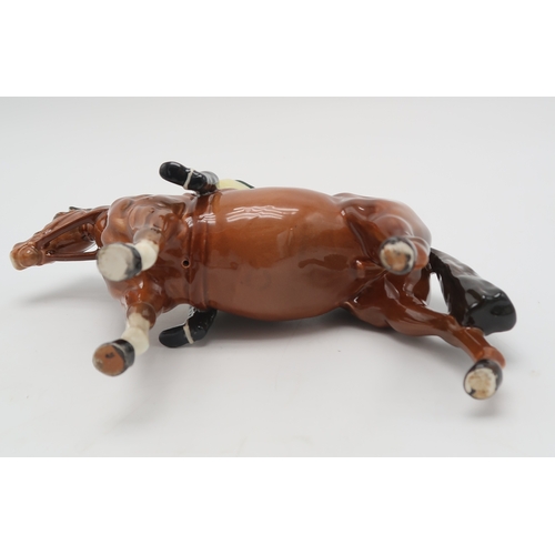 2299 - BESWICK HUNTSMAN ON HORSEmodel 1501 with green jacket, printed mark to underside... 