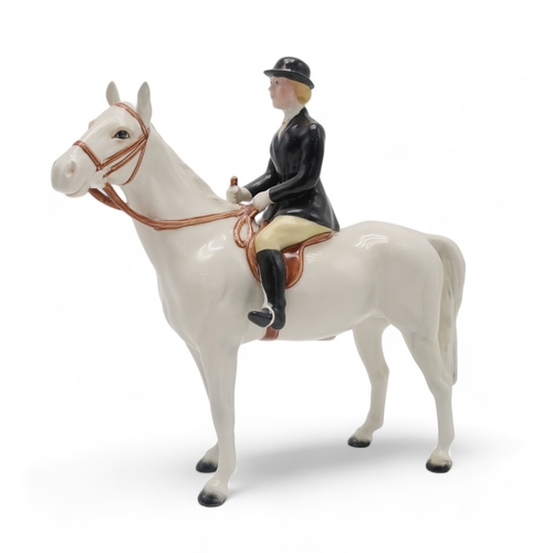 2300 - BESWICK HUNTSWOMAN IN BLACK JACKETon white horse, model 1730