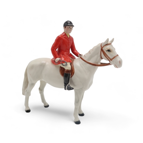 2301 - BESWICK HUNTSMAN IN RED JACKETon white horse, model 1501