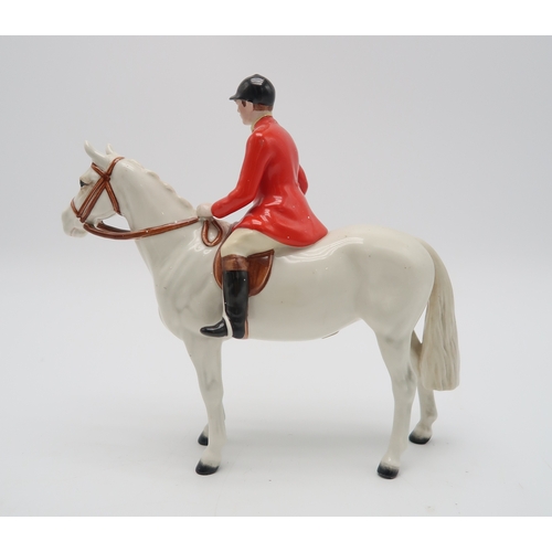 2301 - BESWICK HUNTSMAN IN RED JACKETon white horse, model 1501