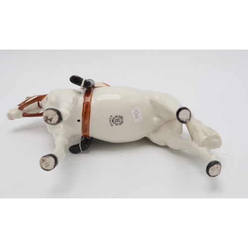 2301 - BESWICK HUNTSMAN IN RED JACKETon white horse, model 1501