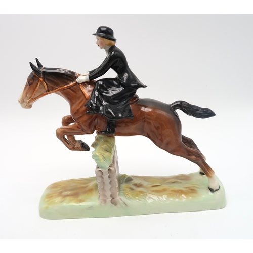 2304 - A BESWICK HUNTING GROUPincluding Huntsman on rearing horse, model 868, Huntsman on horse, model 1501... 