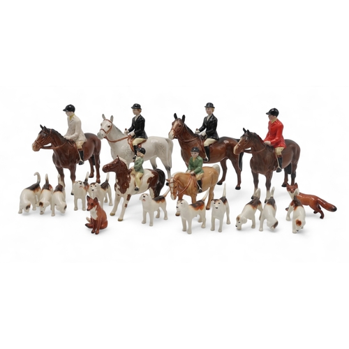 2306 - A BESWICK HUNTING GROUPincluding two Huntswoman on horse, one on grey example, model 1730, two Hunts... 