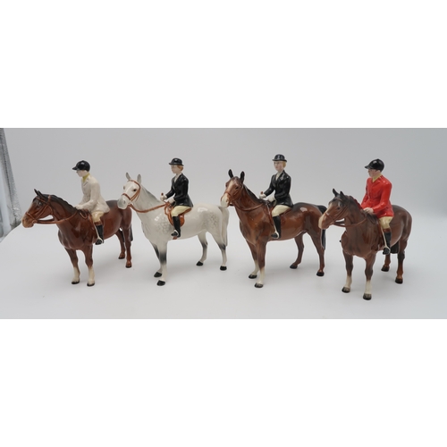 2306 - A BESWICK HUNTING GROUPincluding two Huntswoman on horse, one on grey example, model 1730, two Hunts... 