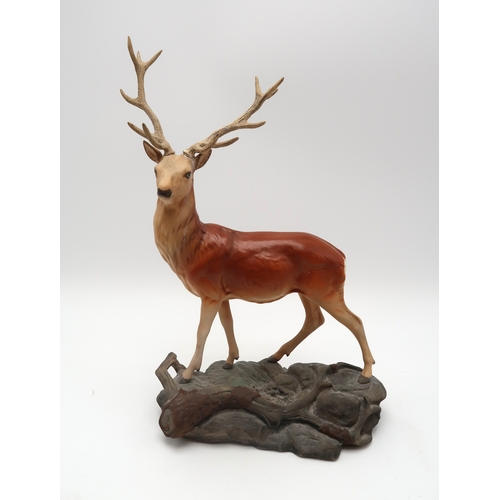 2308 - A BESWICK MATT STAG ON ROCKmodel 2629, together with assorted fox figures including  four model 1016... 