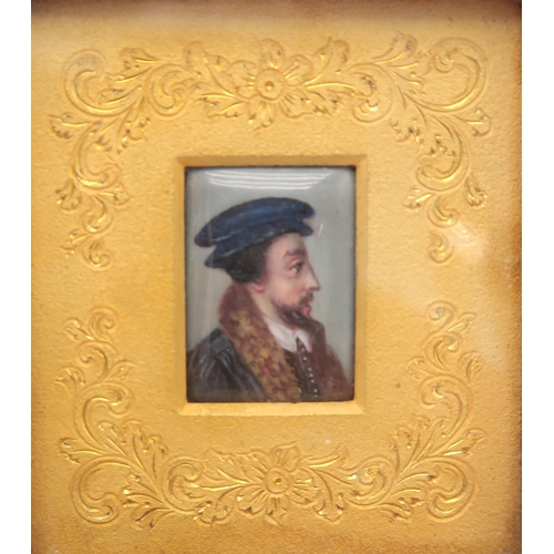 2309 - AN ENAMEL MINIATURE PORTRAIT OF A MANpossibly John Calvin, with gilt metal surround and housed withi... 