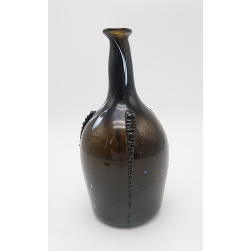 2312 - AN EARLY 19TH CENTURY ALLOA GLASS WINE BOTTLE in dark olive green mottled with white splashes, with ... 