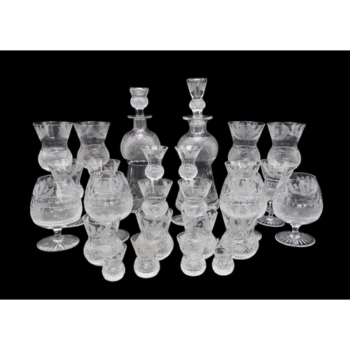 2320 - A LARGE SUITE OF EDINBURGH CRYSTAL THISTLE SHAPED AND CUT GLASSWAREincluding seven goblets 19cm, fiv... 