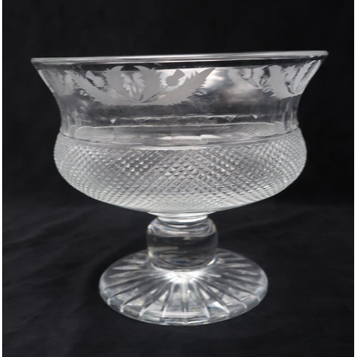 2321 - TWO EDINBURGH CRYSTAL THISTLE BOWLSwith diamond cut body with etched thistle band to rim, 17cm high,... 