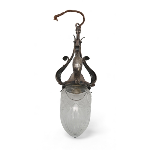 2326 - AN ARTS AND CRAFTS SILVERED BRASS HALL LIGHTwith three S scrolls with hammed decoration and cut glas... 