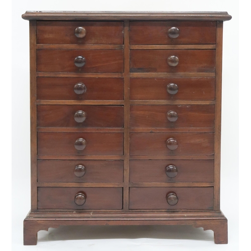 1 - An early 20th century mahogany collectors chest with seven pairs of short drawers on plinth base, 63... 