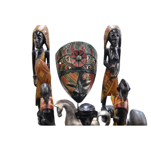 156 - A collection of African painted wooden figures, horses etc (12)