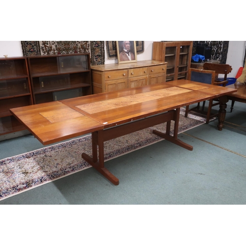 16 - A mid 20th century Scandinavian Skovby teak tile topped extending dining table with drop ends on ref... 