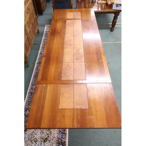 16 - A mid 20th century Scandinavian Skovby teak tile topped extending dining table with drop ends on ref... 