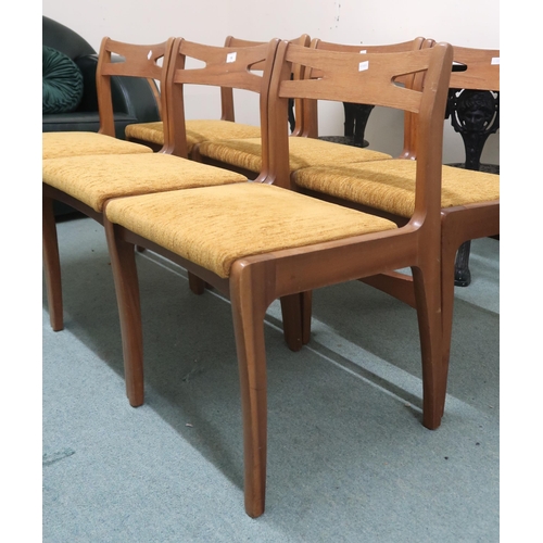 19 - A set of six mid 20th century teak Nathan dining chairs with shaped pierced splats over upholstered ... 