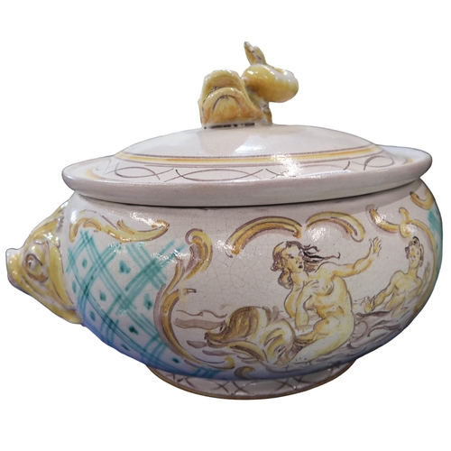 196 - A large Italian pottery pot and cover with grotesque handles and dolphin finial