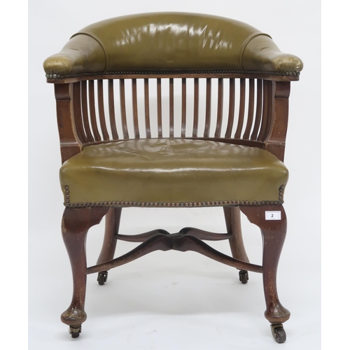 2 - An early 20th century captains style desk chair with green studded leather upholstered back rest and... 