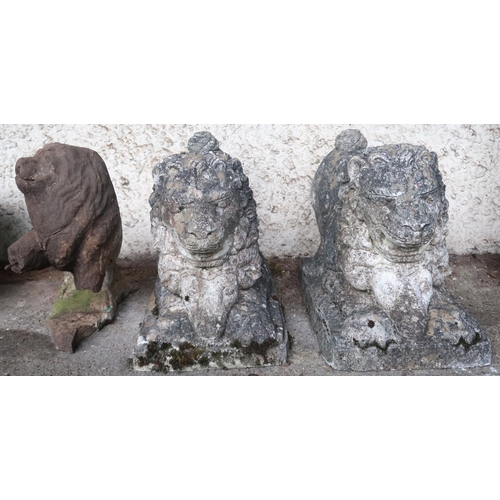 20B - A pair of 20th century reconstituted stone garden lions on plinth bases, 38cm high x 55cm long x 28c... 