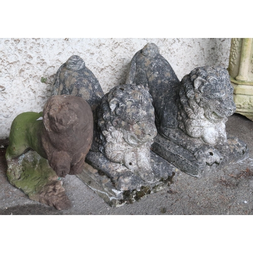 20B - A pair of 20th century reconstituted stone garden lions on plinth bases, 38cm high x 55cm long x 28c... 