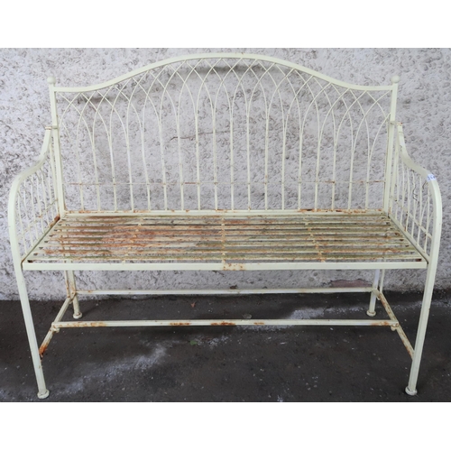 20F - A 20th century yellow painted metallic garden bench with wire work back and sides over slatted seat,... 