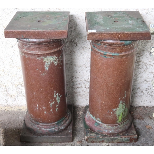 20H - A pair of 20th century stoneware garden pedestals with square tops on cylindrical columns on square ... 