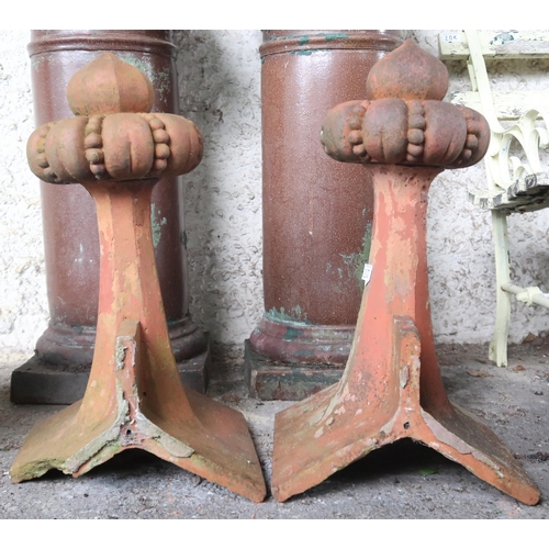 20J - A pair of late Victorian terracotta Art Nouveau style roof finials with stylized florets, 55cm high ... 