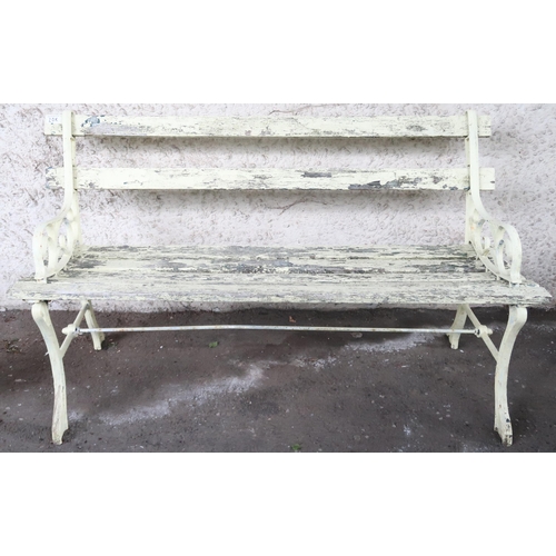 20K - A 20th century yellow painted garden bench with scrolled cast metal ends joined by wooden slats, 69c... 