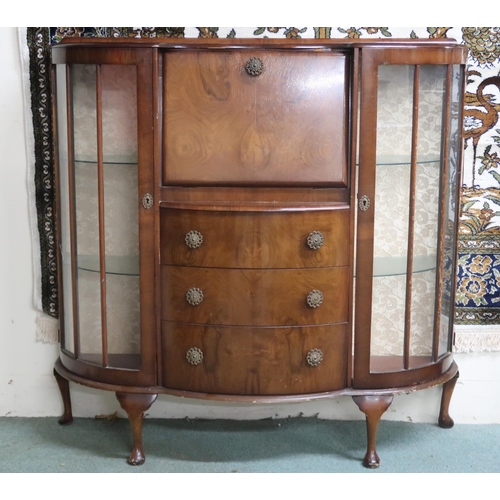 24 - An early 20th century walnut veneered serpentine front bureau bookcase with central fall front writi... 