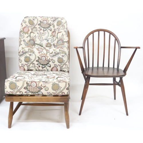 33 - A lot comprising a mid 20th century elm and beech Ercol rail back lounge chair with cream foliate up... 