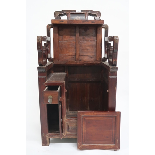 62 - A Chinese hardwood chair with pierced shaped back and arms over hinged seat alongside single drawer ... 