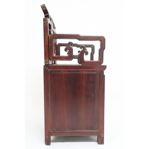 62 - A Chinese hardwood chair with pierced shaped back and arms over hinged seat alongside single drawer ... 