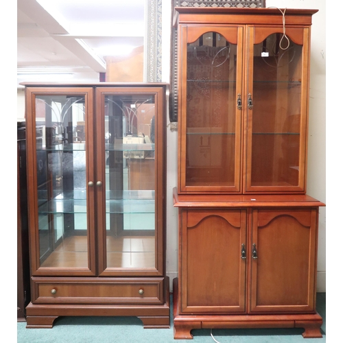 66 - A lot comprising a cotemporary two door glazed display cabinet, 140cm high x 81cm wide x 37cm deep a... 