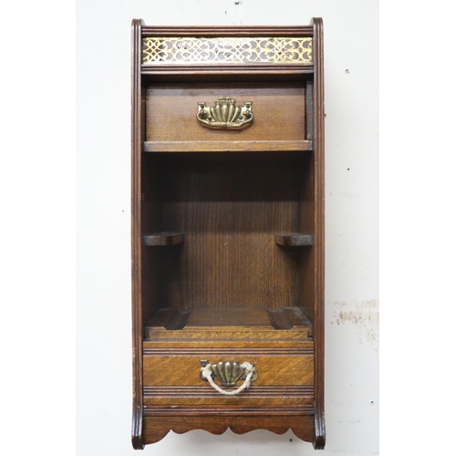 7 - A lot comprising Victorian oak smokers cabinet with pair of glazed doors concealing two short over o... 