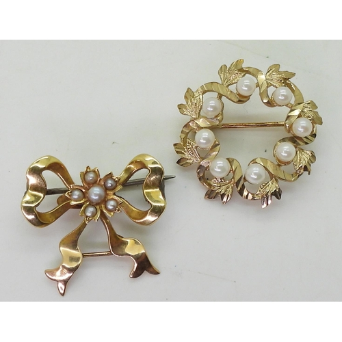 702 - Two 9ct gold brooches set with pearls, weight 7.1gms