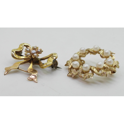 702 - Two 9ct gold brooches set with pearls, weight 7.1gms