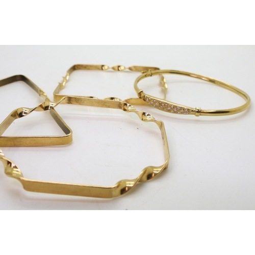 703 - Four 9ct gold bangles, three handmade in unusual shapes, triangle, square, octagon, the four is set ... 