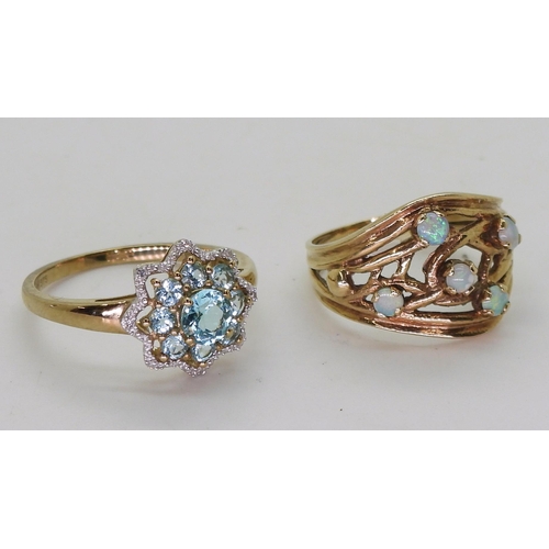 707 - A 9ct gold opal ring, size Q, a blue topaz and diamond flower ring, size S1/2, weight together 6.2gm... 